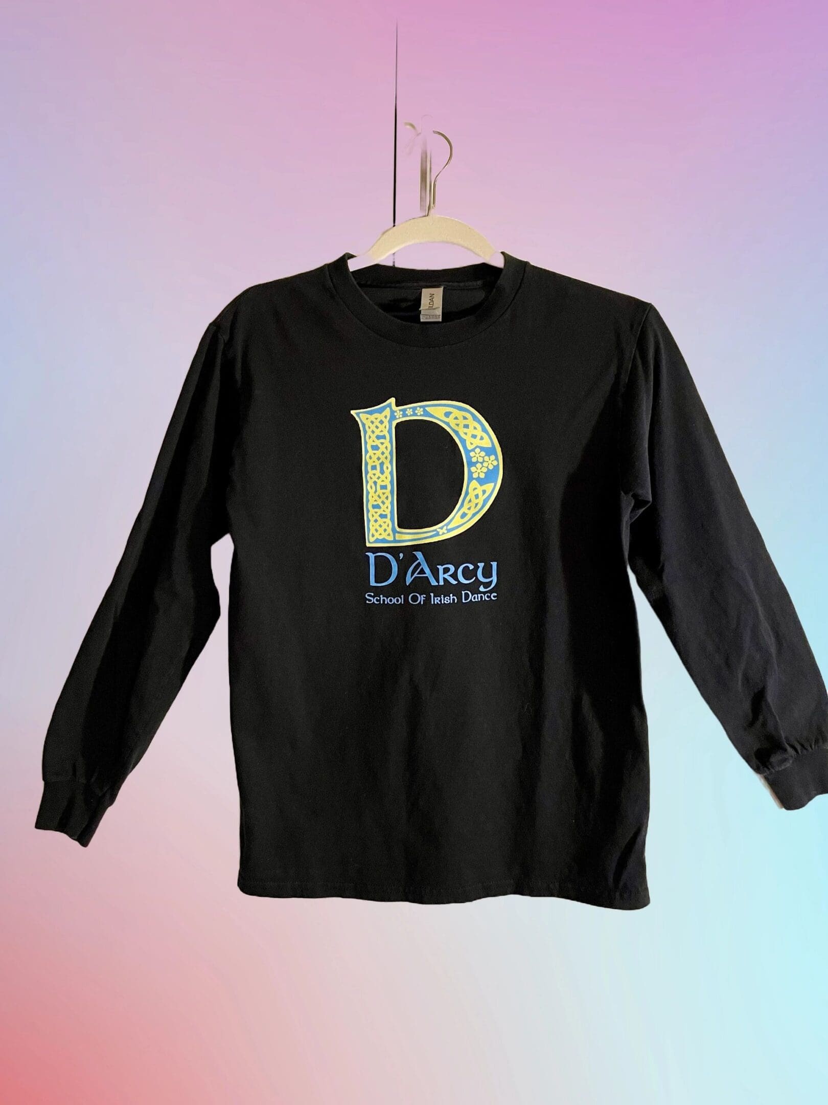 A black long sleeve shirt with the letter d