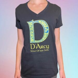 A woman wearing a black t-shirt with the letter d