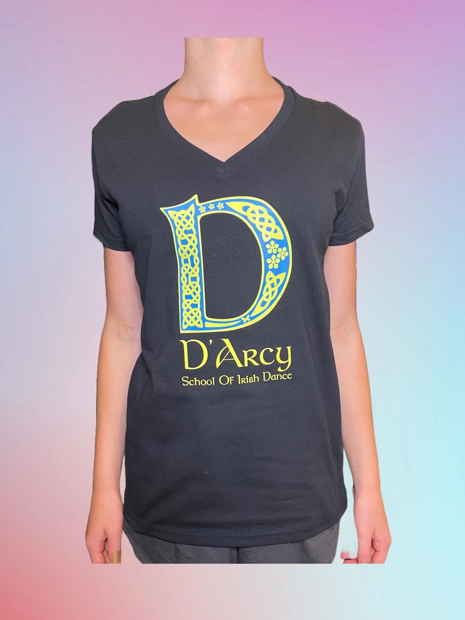 A woman wearing a black t-shirt with the letter d