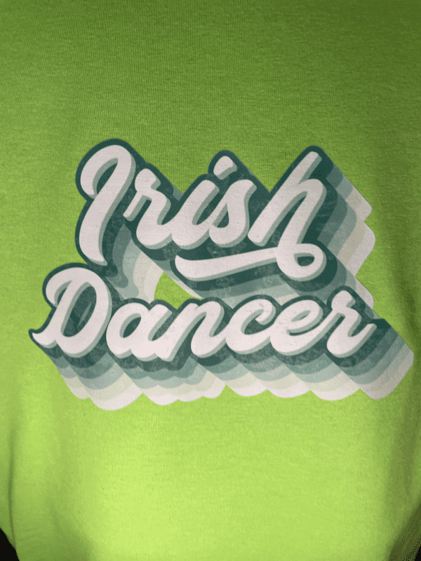 A close up of the words irish dancer on a shirt