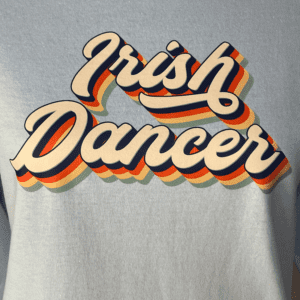 A close up of the words irish dancer on a shirt