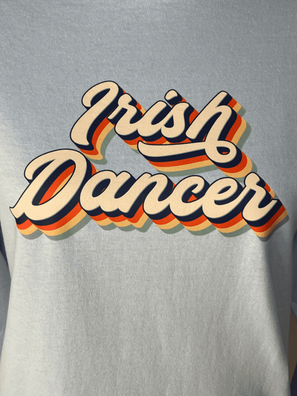 A close up of the words irish dancer on a shirt